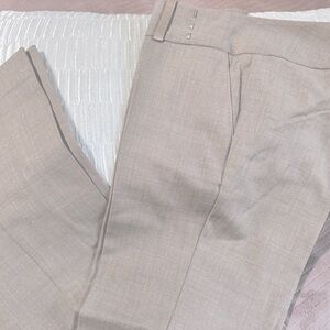 Color light brown with gold treads, 54% polyester, 45%Wool,1% Elastin